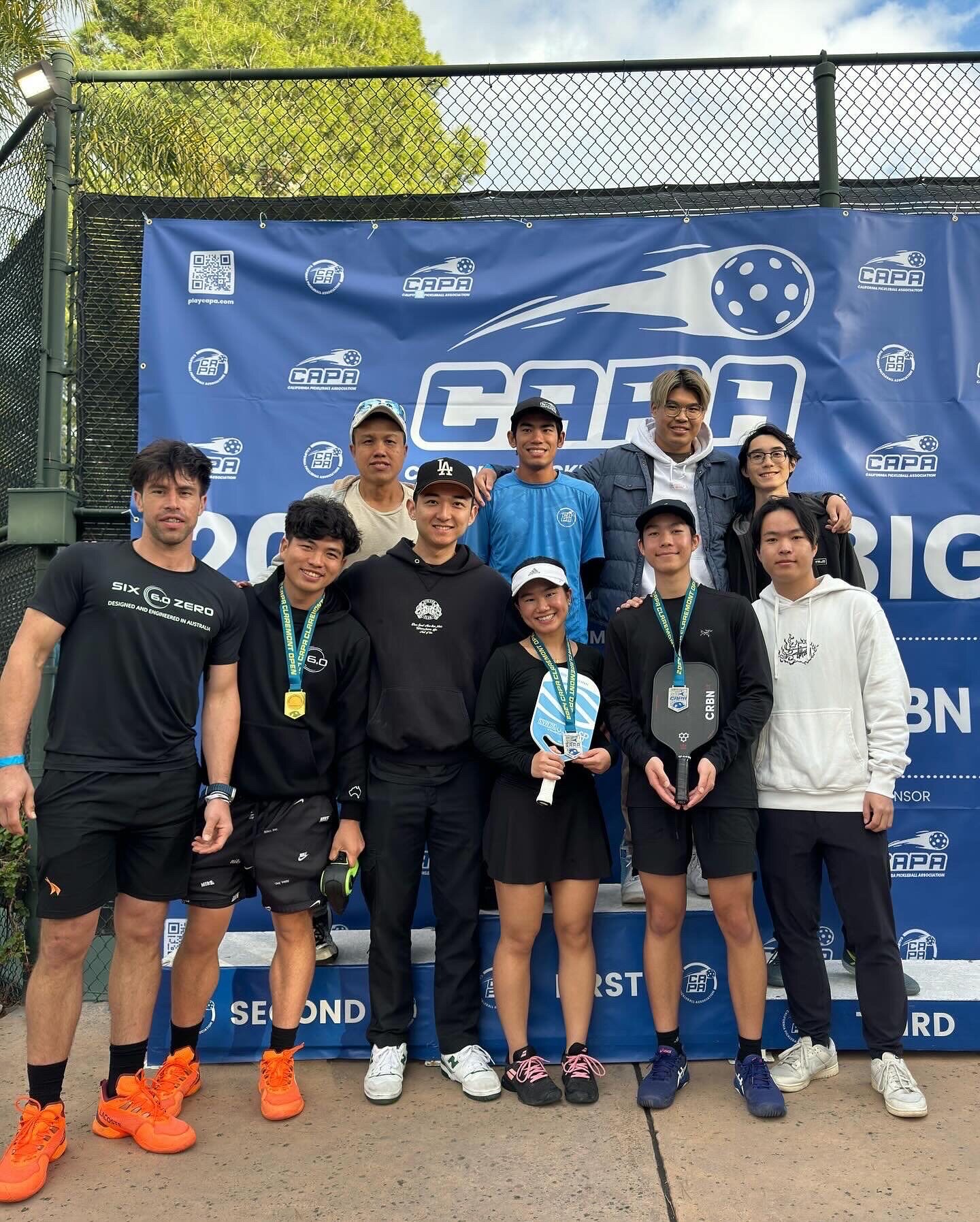 NGSG athletes celebrating medals at a CAPA tournament