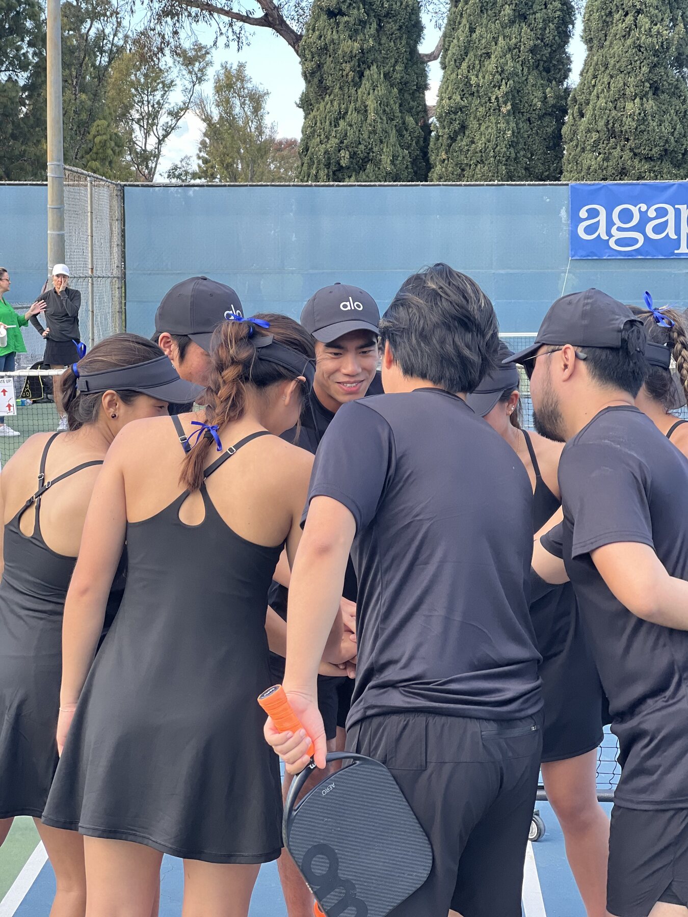 Athletes gathering together at an NGSG community event